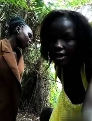 two exotic Ebonys playing in jungleand pissing each other - icpvid.com