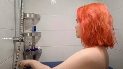 Tattooed redhead touches herself in the bathroom - nvdvid.com