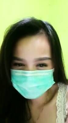 Playful Indonesian hottie wears a facemask while rubbing - icpvid.com - Indonesia