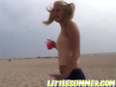 Petite teen masturbating on the beach - txxx.com