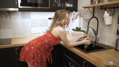 Solo babe plays with her snatch in the kitchen - xbabe.com